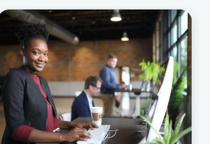 A recruiting team working together in an office